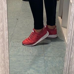 Red/pinkish New balance shoes